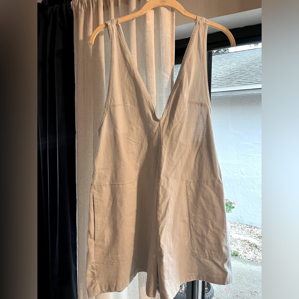 Free People beach Romper. No tags, but never worn. Tank style with loose shorts.